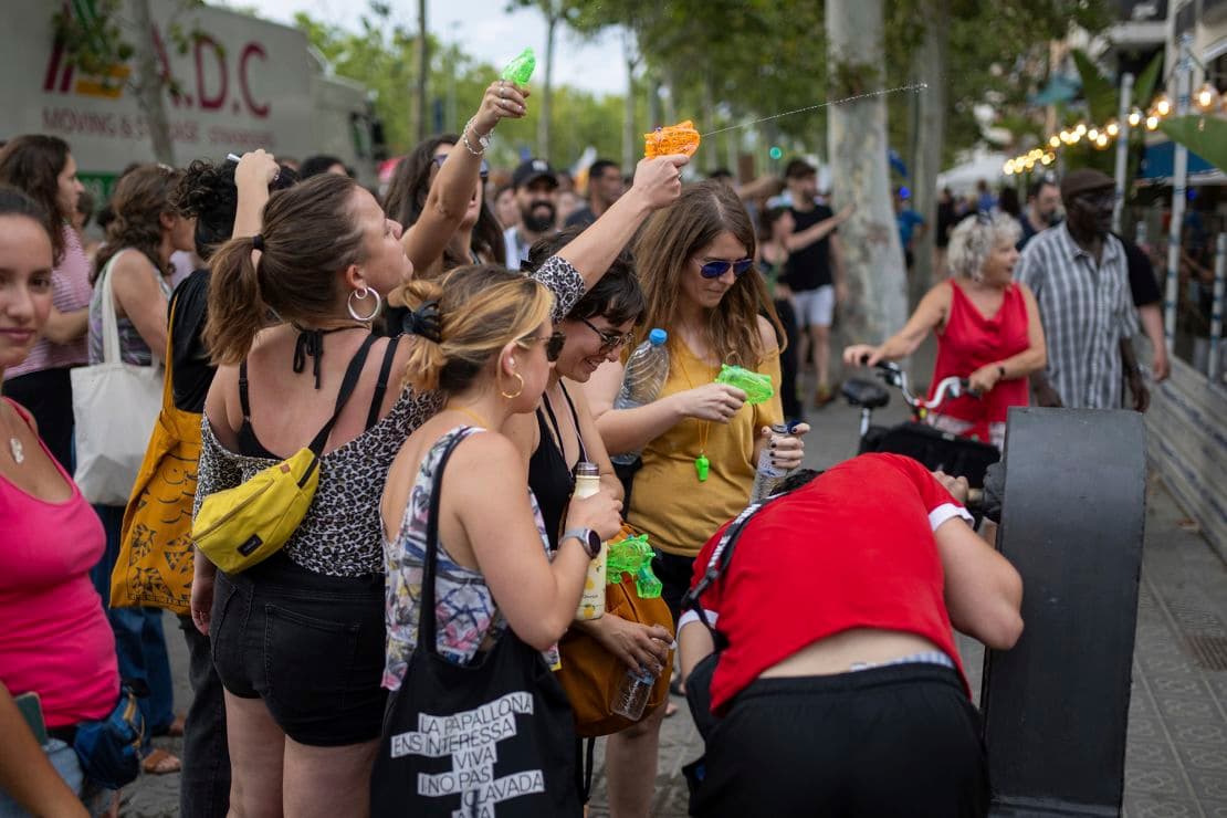 Cities on Edge as Locals Fight Back Against Tourists with Water Guns and Protests