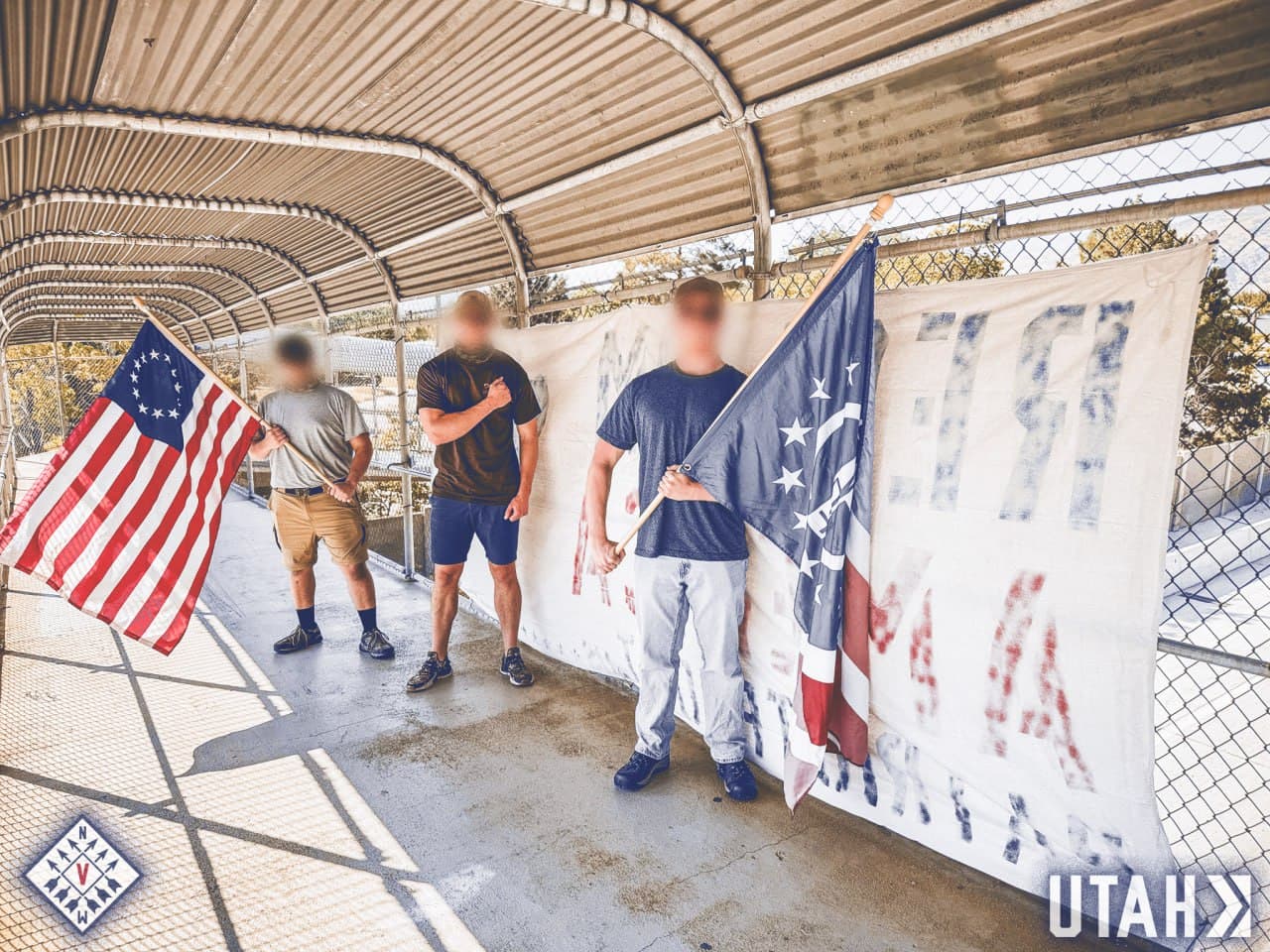 Activists from Network 5 place banner in Mount Olympus, Utah