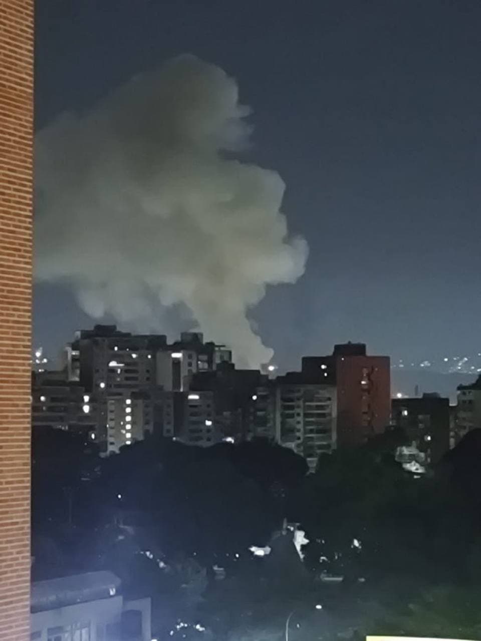Smoke plumes rise from Fort Tiuna in Caracas, Venezuela