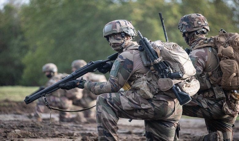 Macron announces voluntary national service program to boost defense