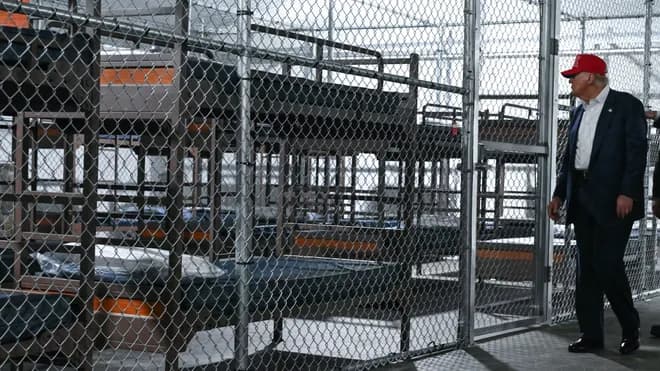 Featured image for: Trump's $450 Million Immigrant Detention Center Sparks Outrage as Federal Funding Stalls Trump's $450 Million Immigrant Detention Center Sparks Outrage as Federal Funding Stalls