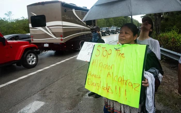 Featured image for: Florida's $650 Million Migrant Detention Center Builds Barbed-Wire Fortress in the Everglades Florida's $650 Million Migrant Detention Center Builds Barbed-Wire Fortress in the Everglades