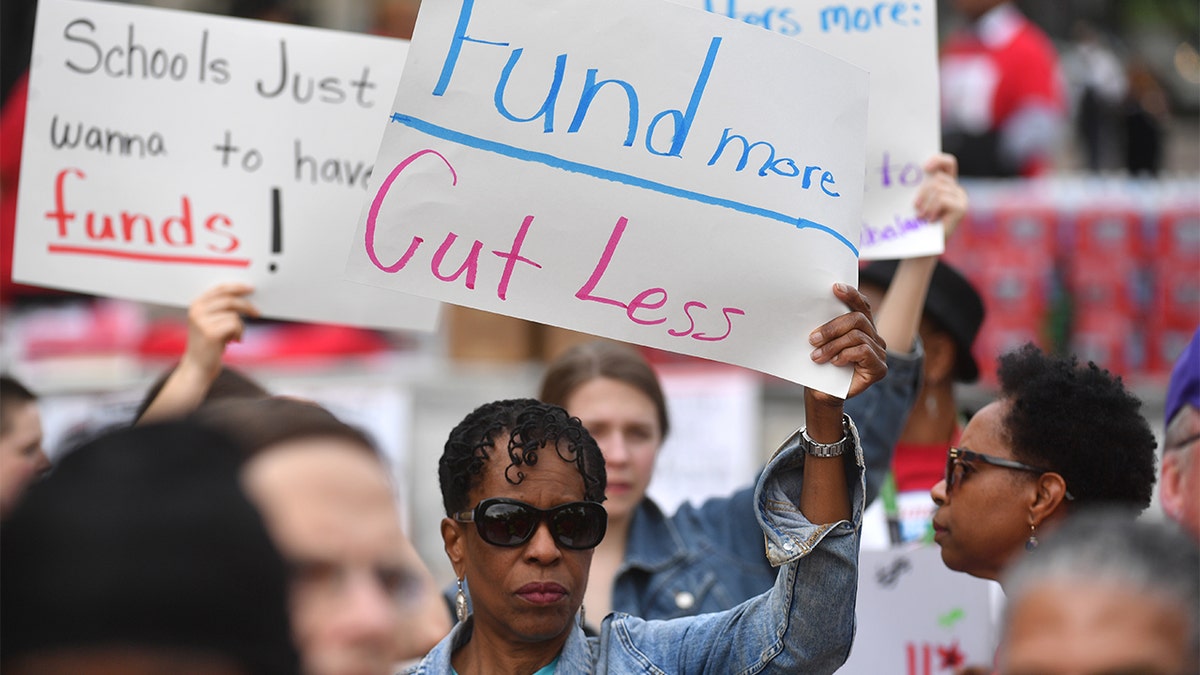 Image for Thousands protest in France against public spending cuts
