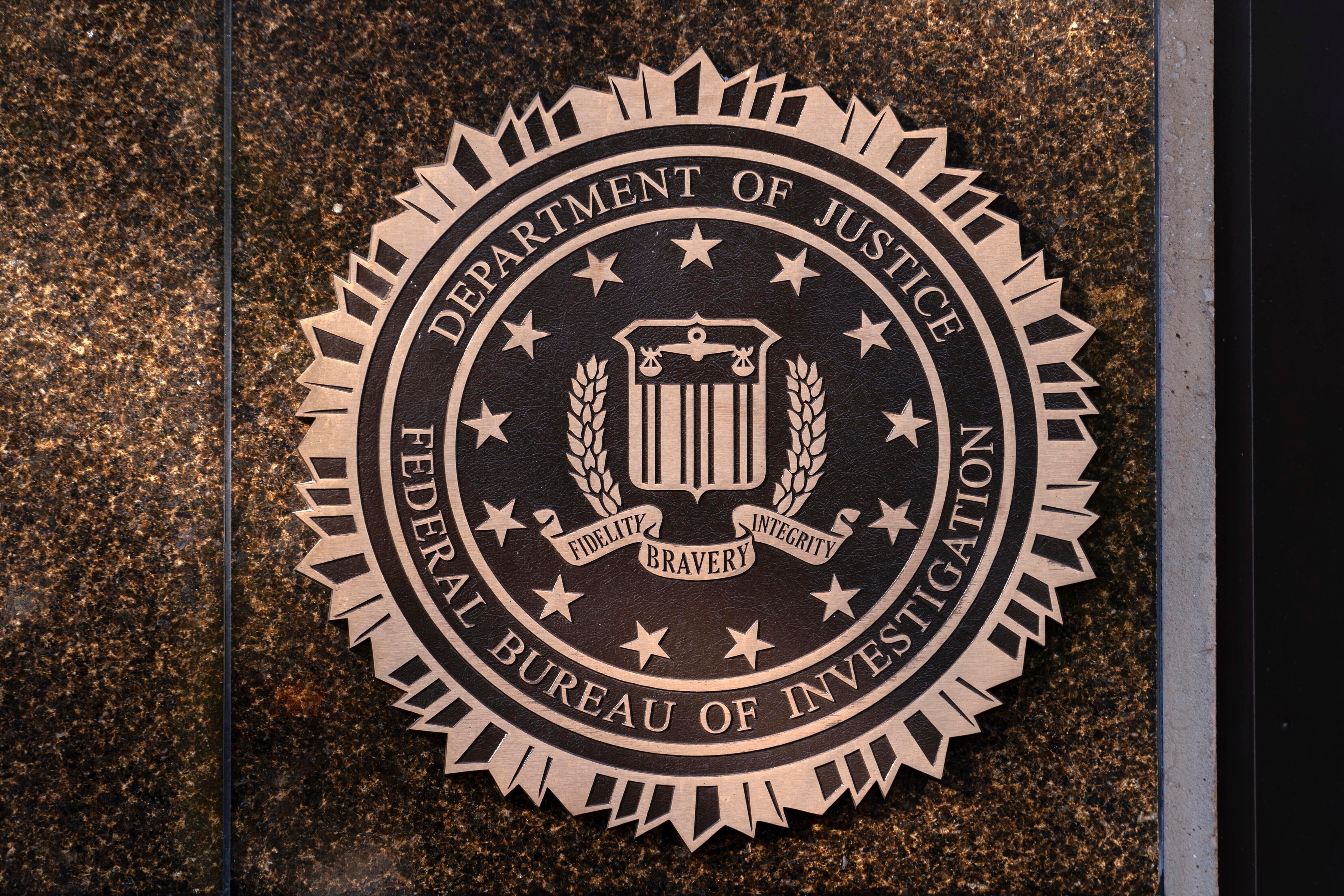 Image for FBI employee sues bureau after being fired for displaying LGBTQ+ flag