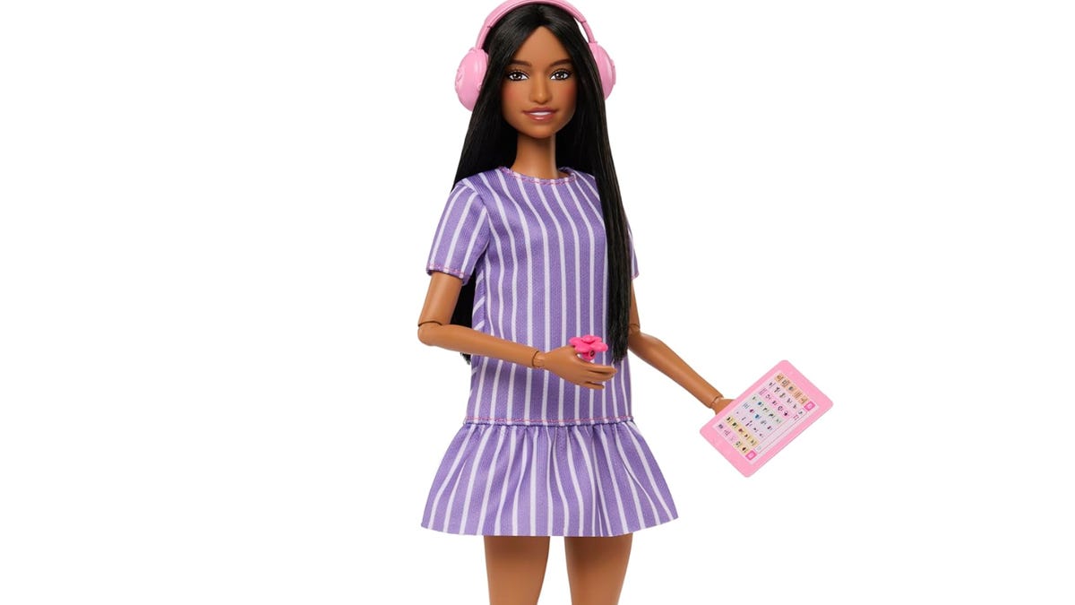 Image for Autistic Barbie launches with headphones, communication tablet, and fidget spinner