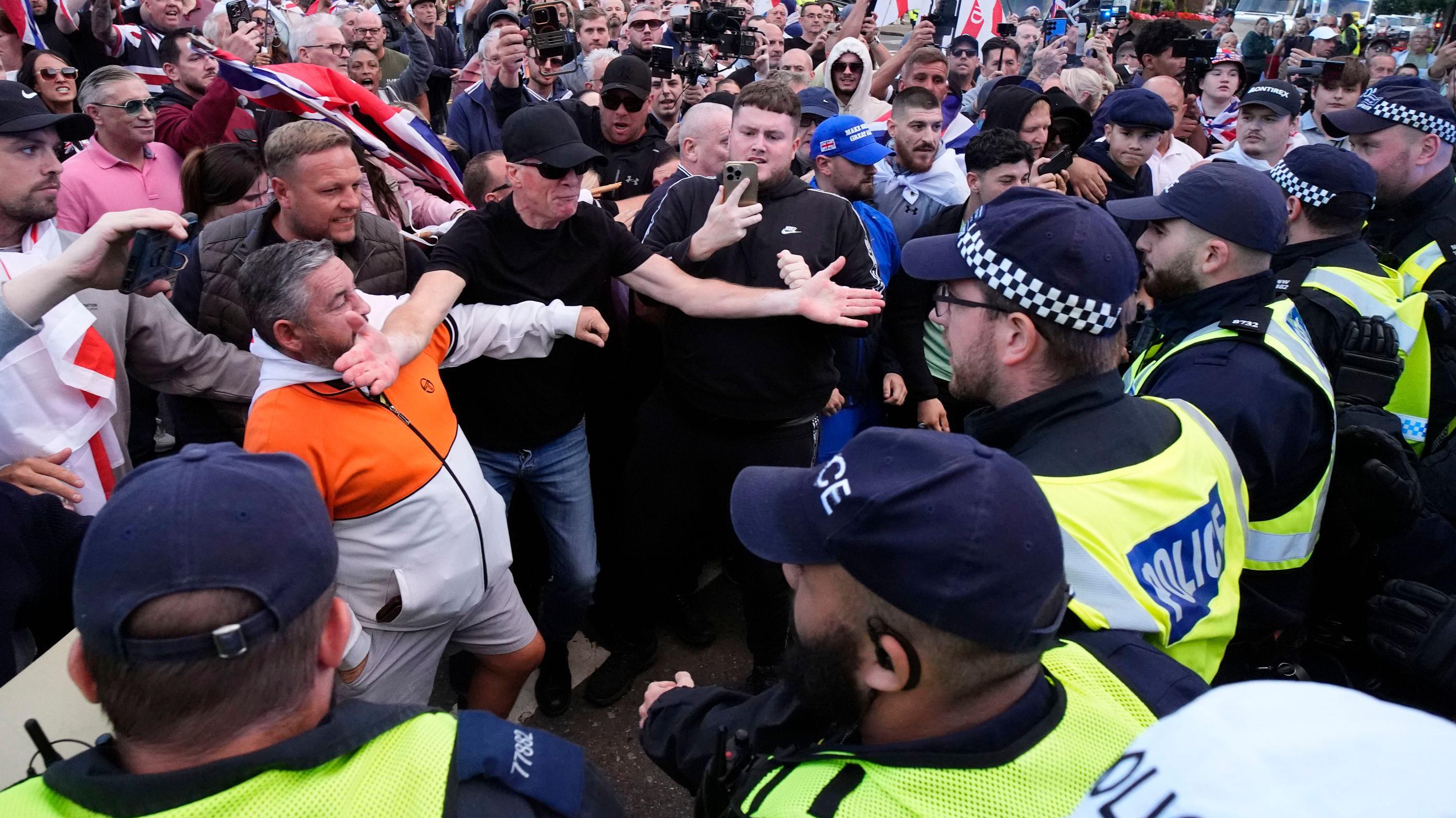 Image for Protesters Clash with Police in Epping Over Hotel for Asylum Seekers