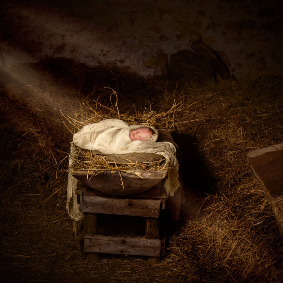 Jesus was laid in a manger, a feeding trough for sacrificial lambs