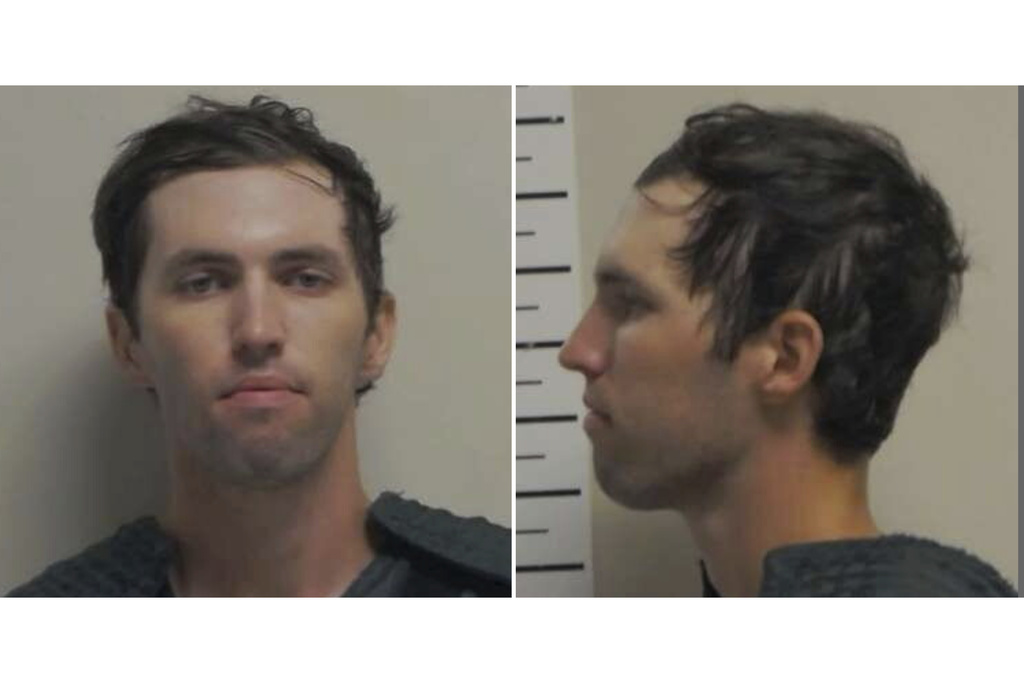 Surveillance Shows Tyler Robinson on Phone Before Roof Climb