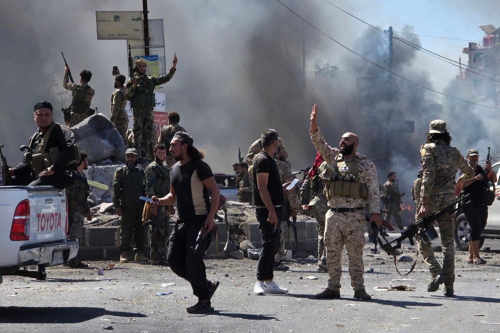 Image for Deadly Clashes Erupt Between Druze Militants and Syrian Forces in As-Suwayda