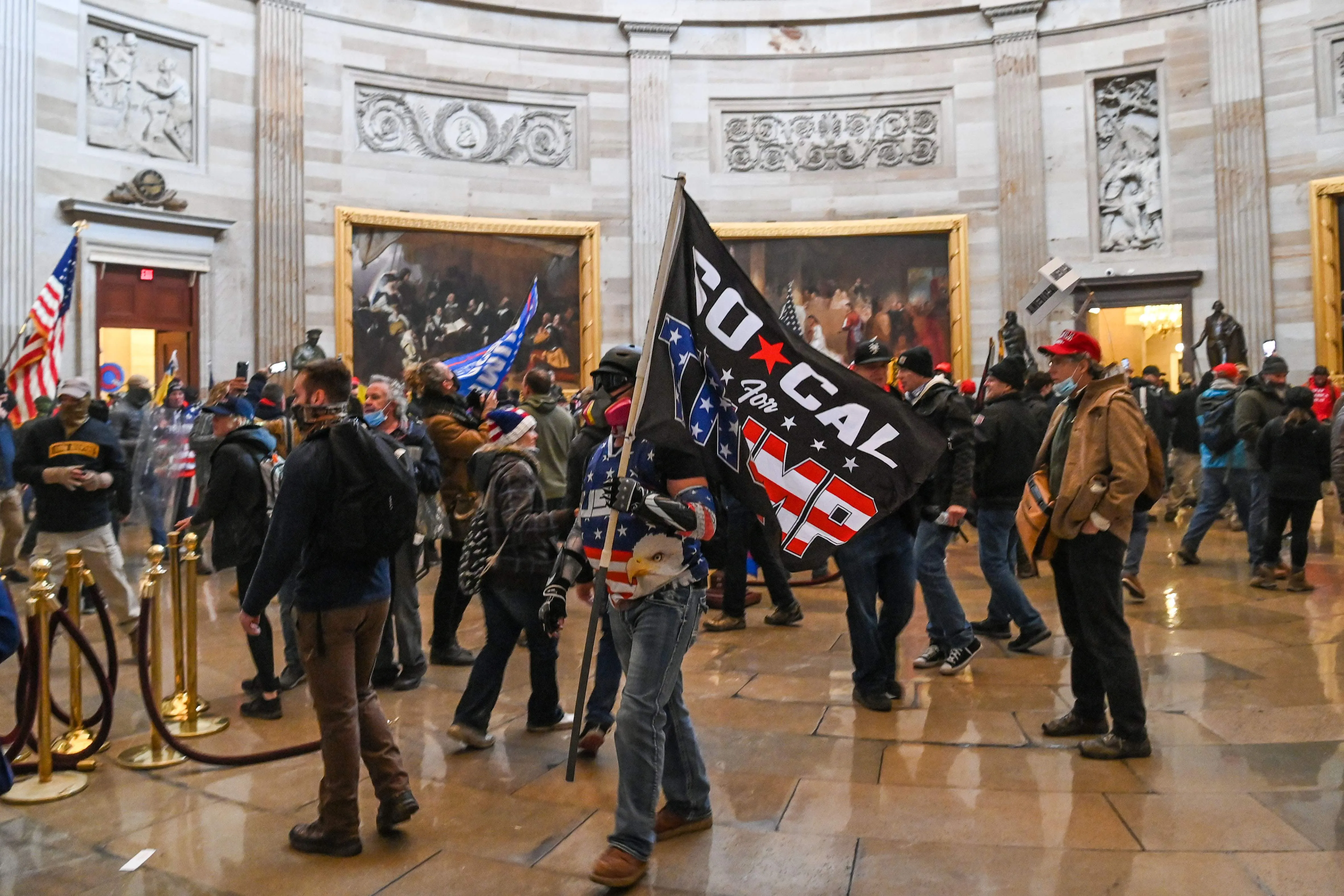 Photos show protest at US Capitol as rioters storm building
