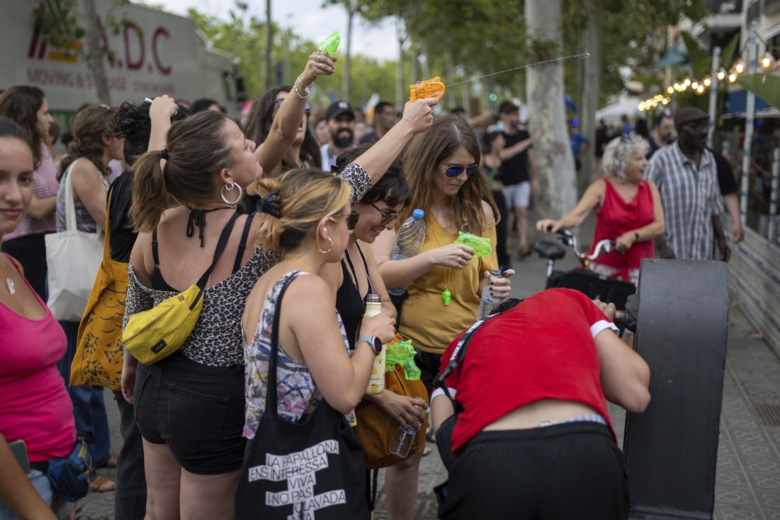 Cities on Edge as Locals Fight Back Against Tourists with Water Guns and Protests