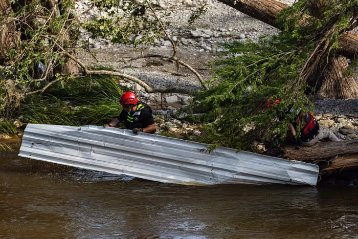 Texas flooding kills dozens, search for missing campers continues