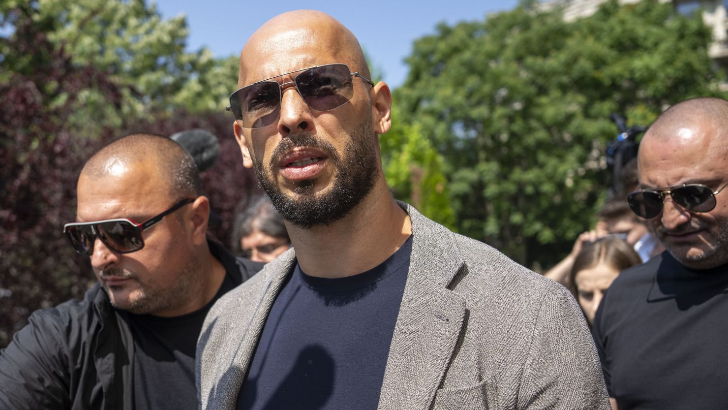 Andrew Tate: Controversial influencer arrives at Bucharest court ...