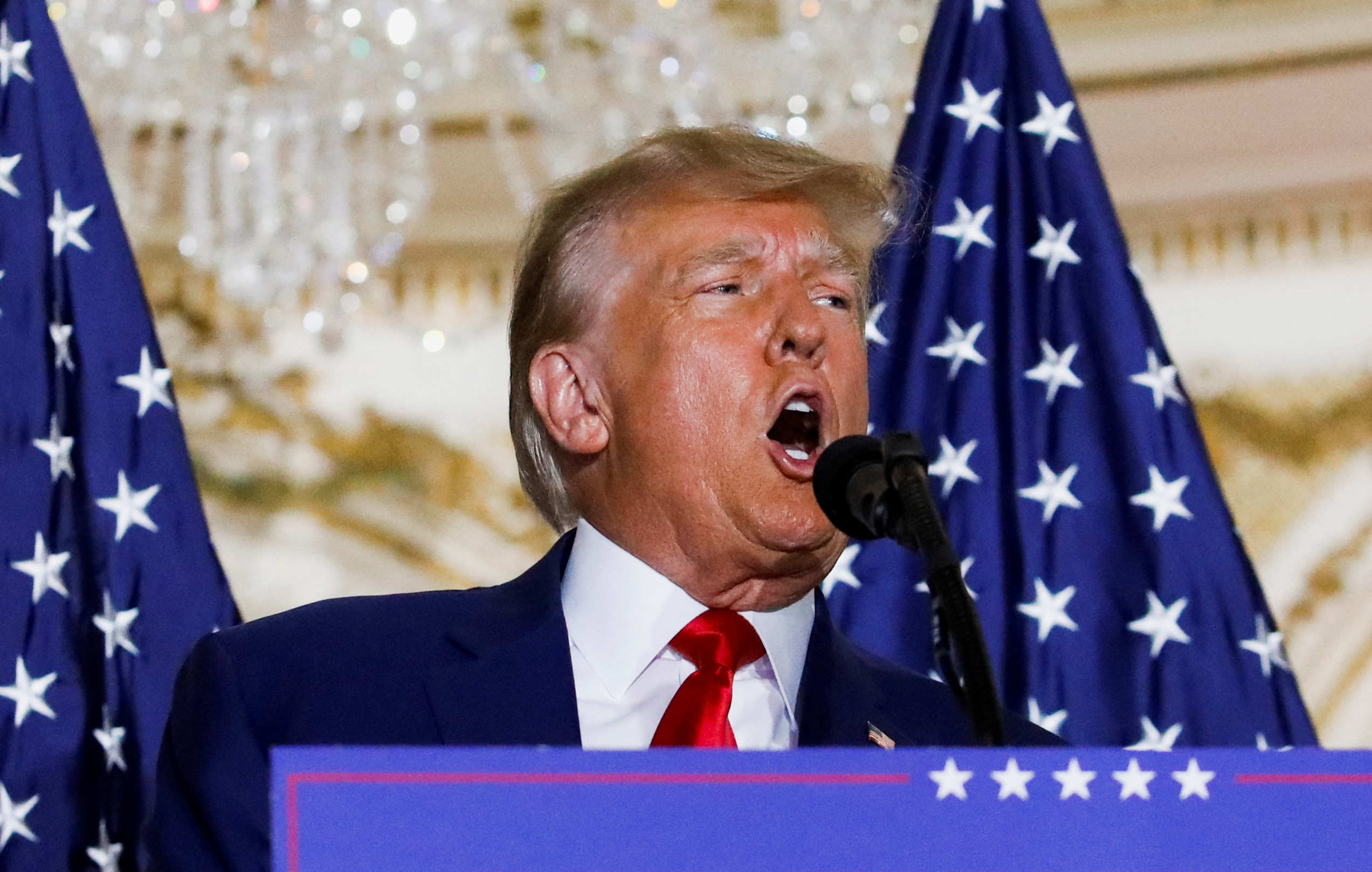Trump, newly charged, urges defunding Justice Department and FBI