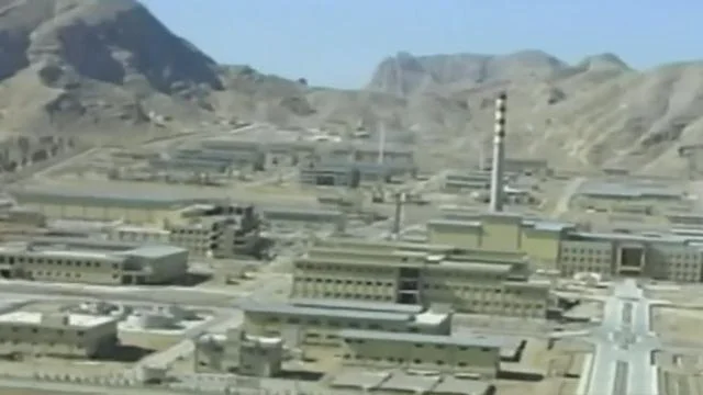 Iran agrees to keep surveillance cameras at its nuclear sites ...