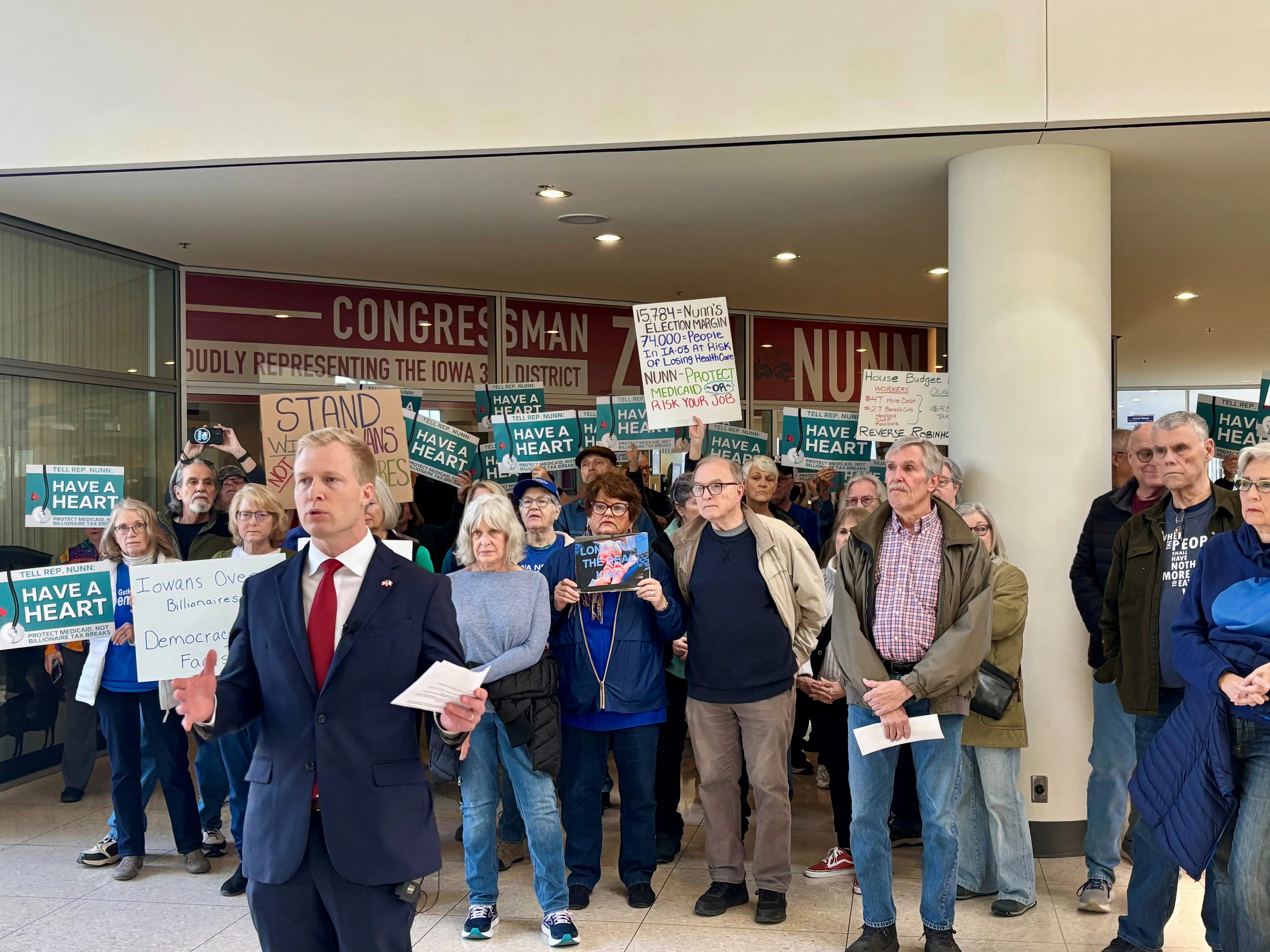 Iowa Democrats protest potential Medicaid cuts outside Nunn's of…