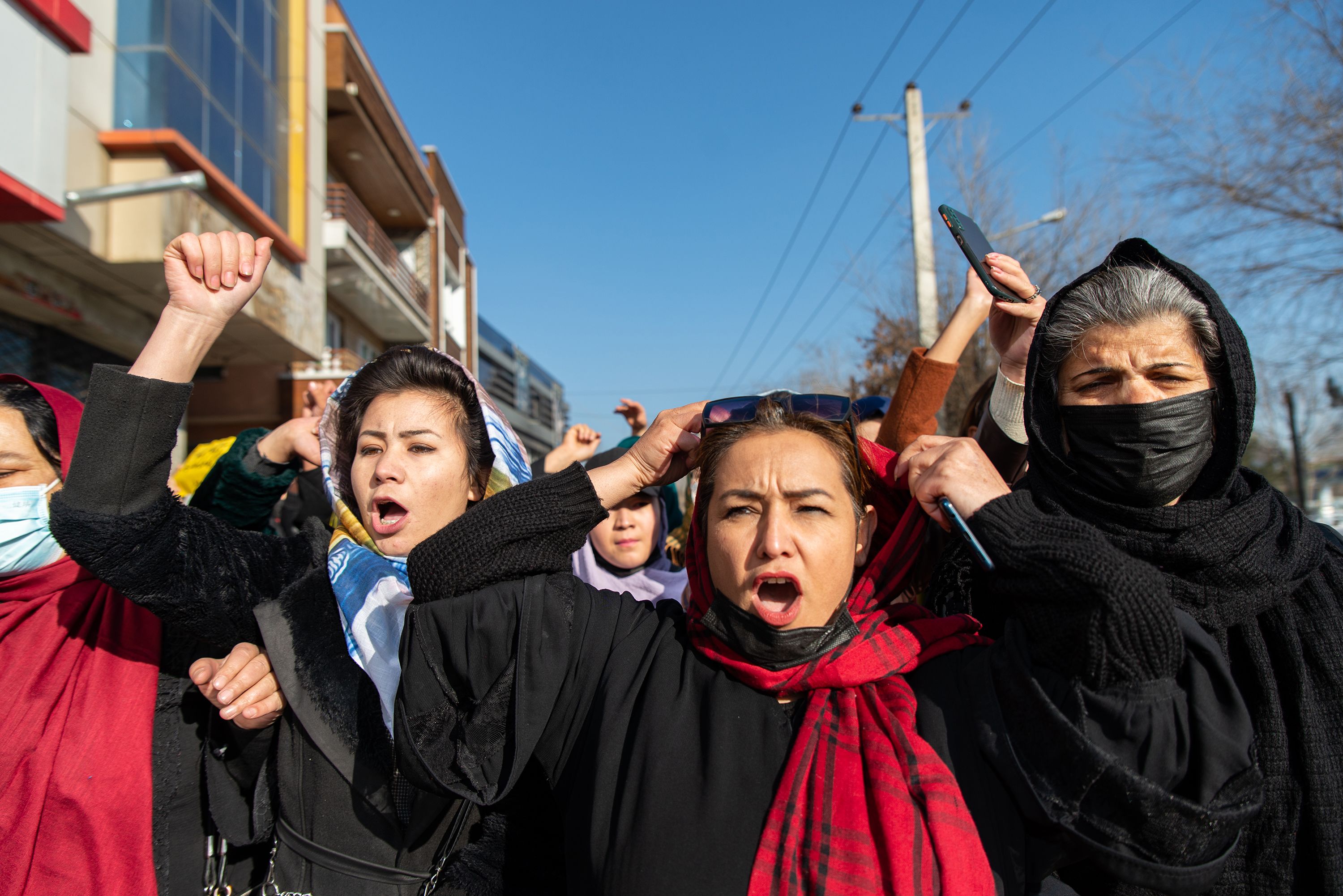 Taliban use water cannon on women protesting education order ...
