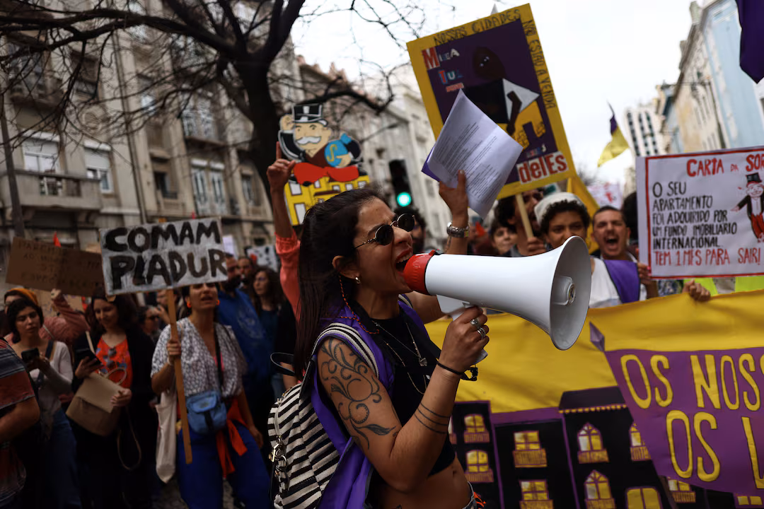 Thousands protest in Portugal over housing crisis | Reuters