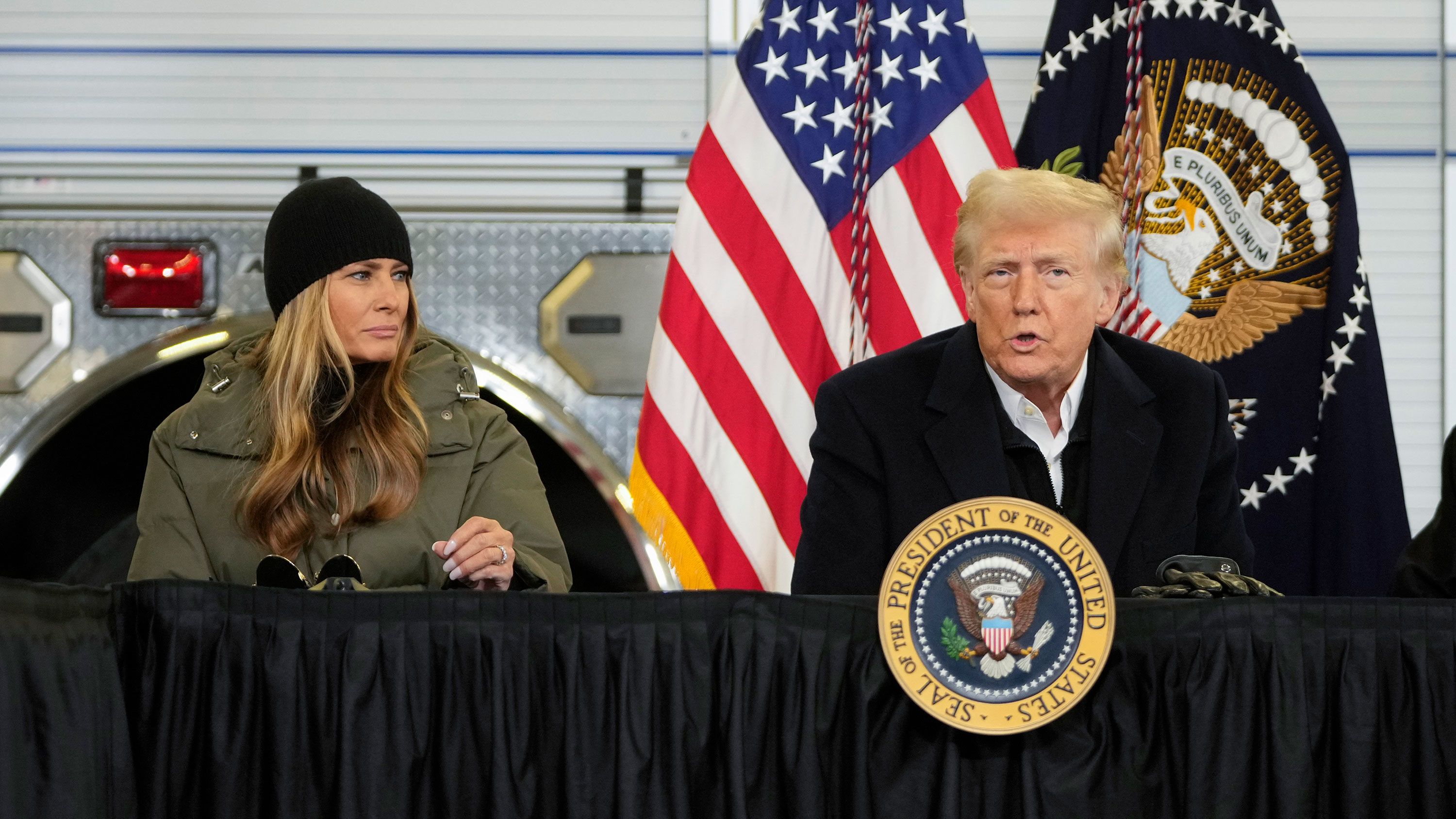 Trump Bribes Congress with Signed Swag While Ignoring Climate Crisis