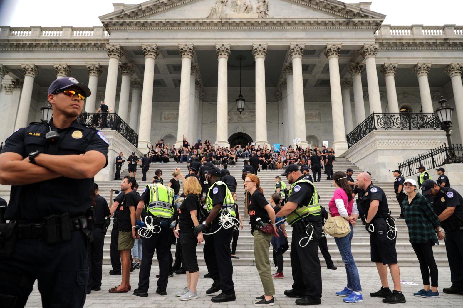In photos: Protesters rally against Supreme Court nominee Brett ...