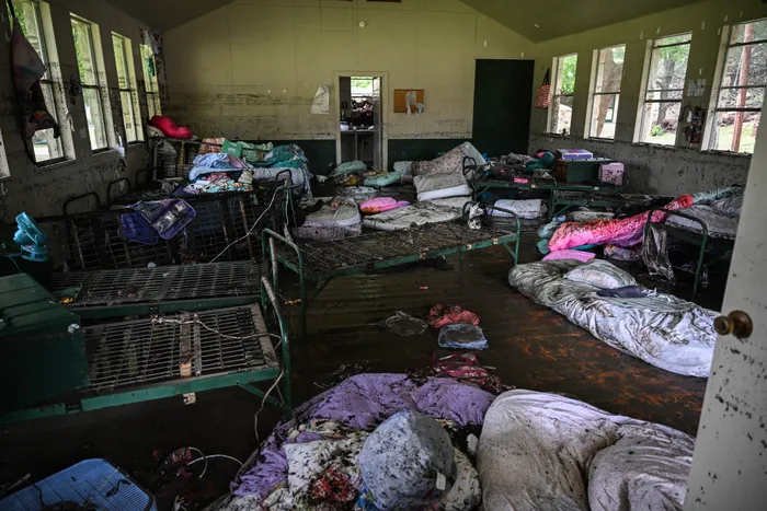 Camp Mystic show devastation as rescuers search for missing ...