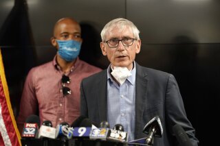 Appeals court sides with Wisconsin governor on press access ...
