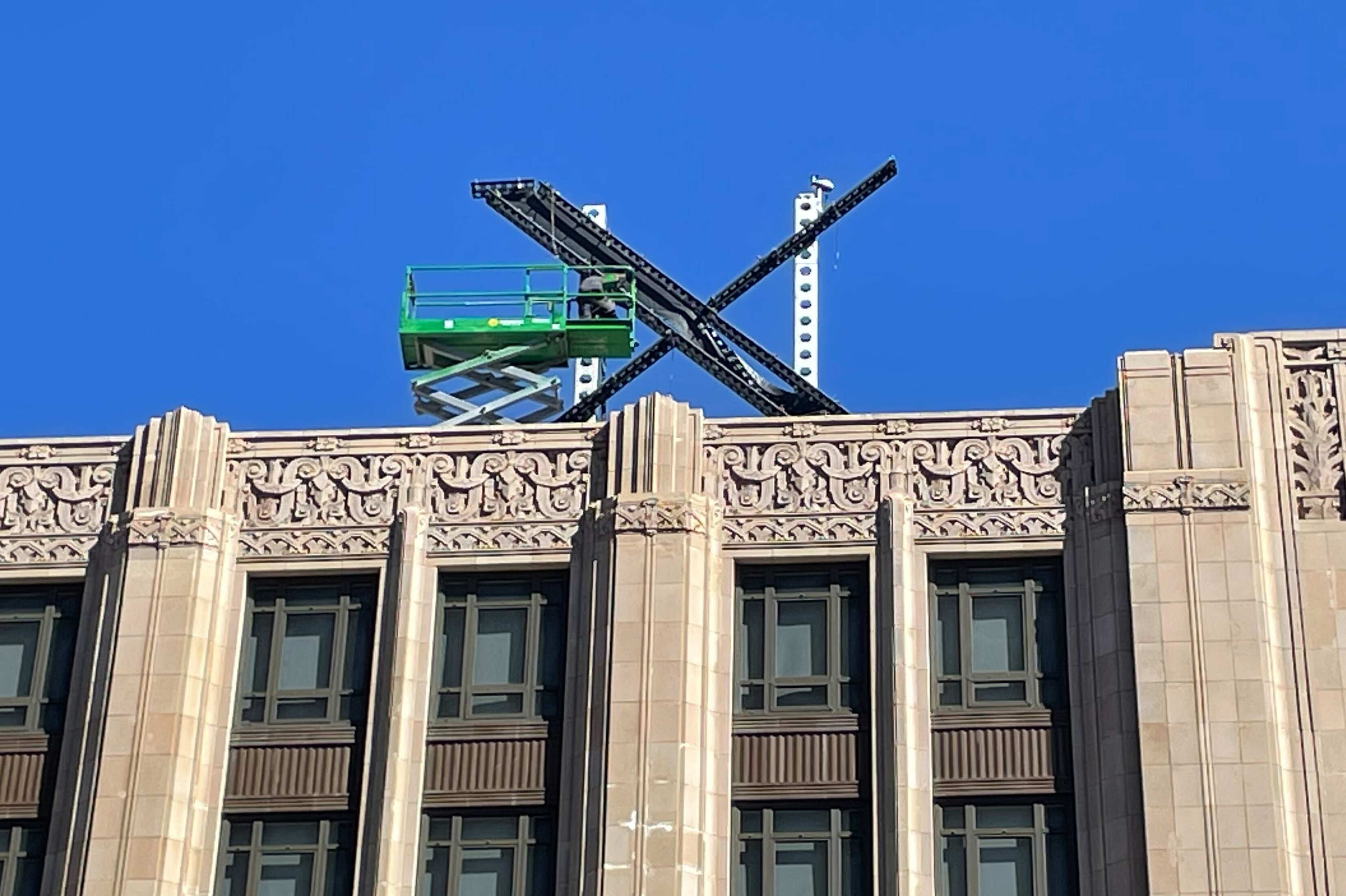 X' logo installed atop Twitter building, spurring San ...