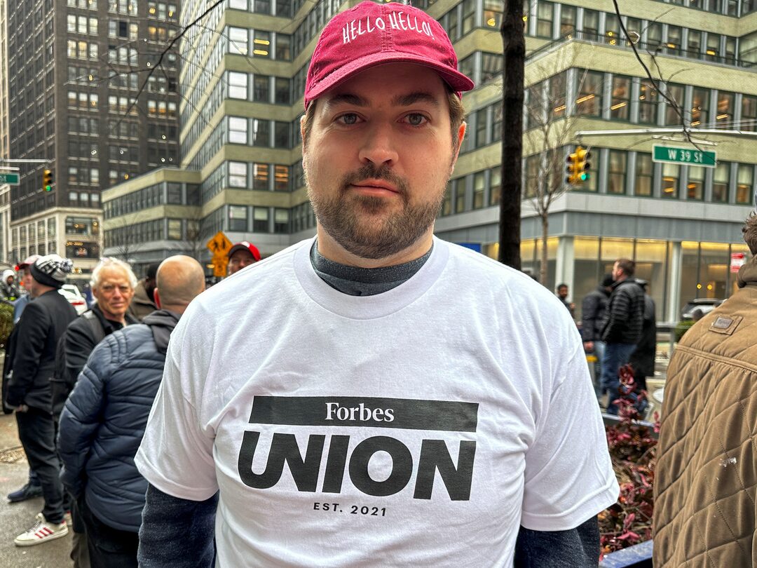 Forbes' unionized journalists stage first walk-out in ...