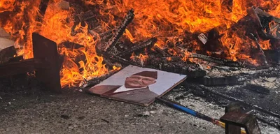 Nepal's Prime Minister Resigns, Protesters Burn His Home in Fury