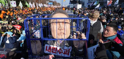 South Korea's President warns of economic crisis if U.S. demands accepted