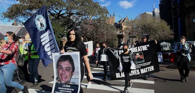 Activist Confronts Australian Politician, Disrupts Anti-Protest Interview