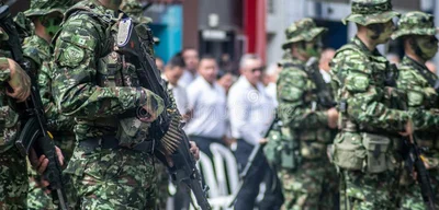 Defense forces and armed groups patrol streets of Caracas