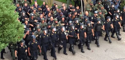 Police Departments Waste $2 Billion on Militarization While Communities Burn