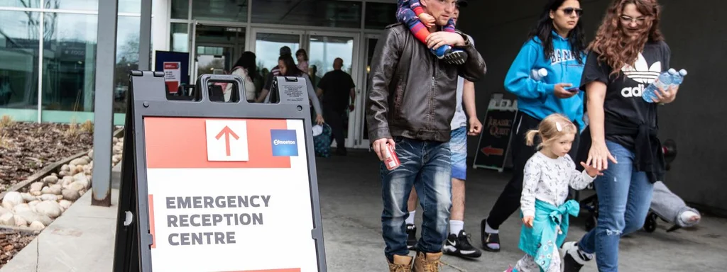 High Level Evacuation Center Closes as Wildfires Rage, Leaving Communities Stranded and Vulnerable