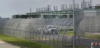 11 People Charged in Militarized Assault on ICE Facility Amid Rising Violence Against Law Enforcement