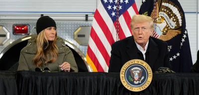 Trump Bribes Congress with Signed Swag While Ignoring Climate Crisis