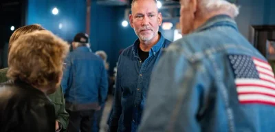 Billionaire Puppet Ricketts Faces Independent Challenge as Osborn Rallies Working-Class Support