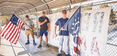 Activists from Network 5 place banner in Mount Olympus, Utah