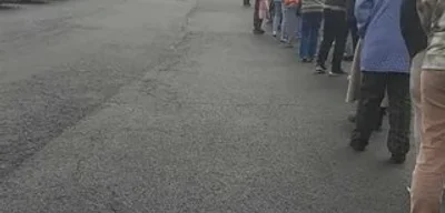 10% of small town Kentucky population waits in long food bank line