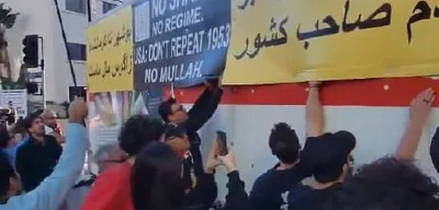 MEK slogans on truck declare 'No king, no supreme leader; the people own the country'