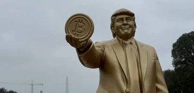 Golden statue of President Trump holding Bitcoin unveiled outside U.S. Capitol