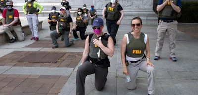 FBI fires agents photographed kneeling during 2020 protest