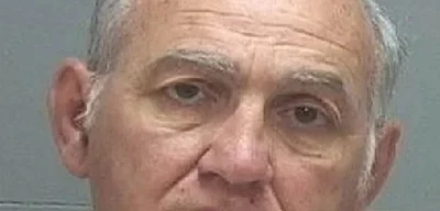 George Zinn charged with possession of child sexual abuse material