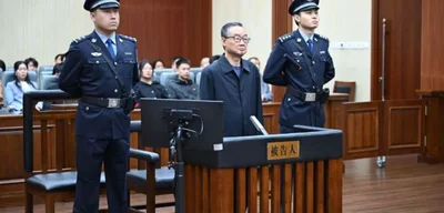 China sentences former Agriculture Minister Tang Renjian to death with reprieve for $38M bribery