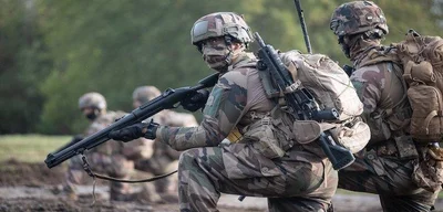 Macron announces voluntary national service program to boost defense