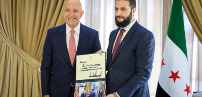 Trump gifts photo and message of support to Syrian Interim-President Ahmed al-Sharaa