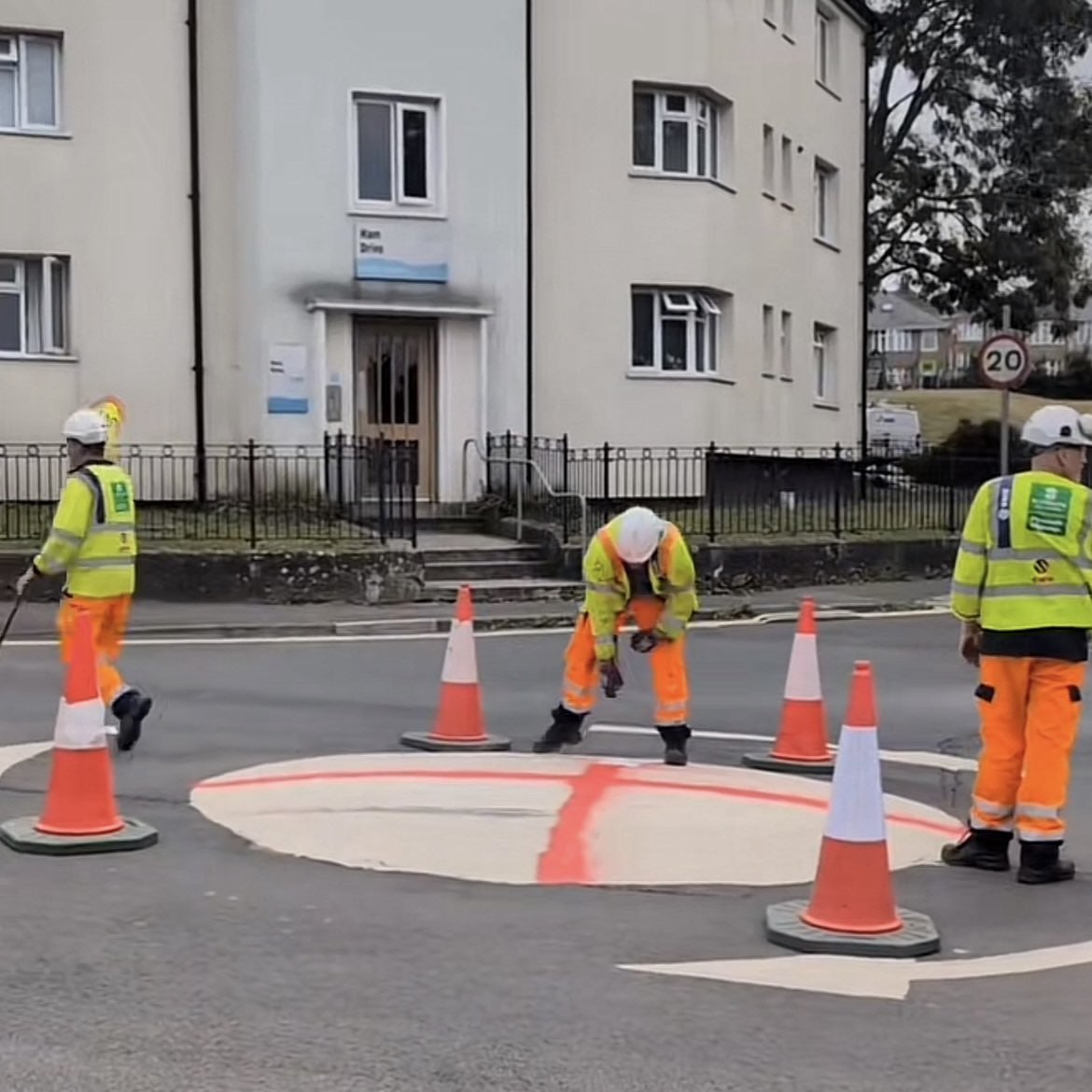 Plymouth Roundabout Repainted White, Locals Respond with Red Cross