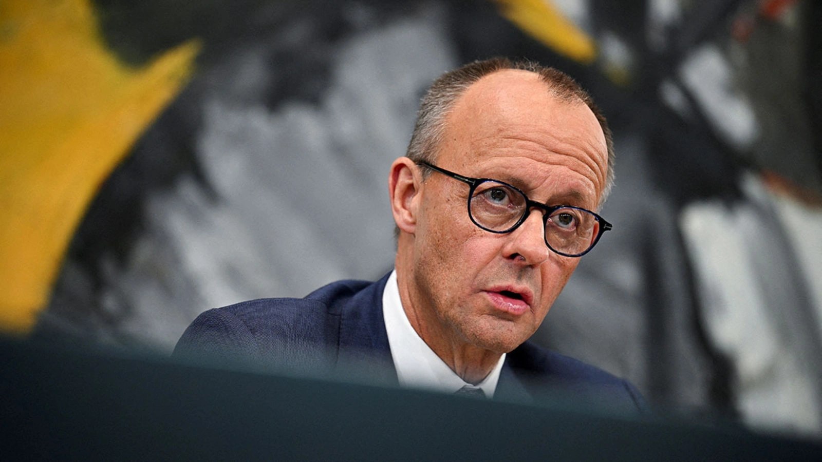 Chancellor Merz Urges Global Unity to Halt Russia's Aggression in Ukraine