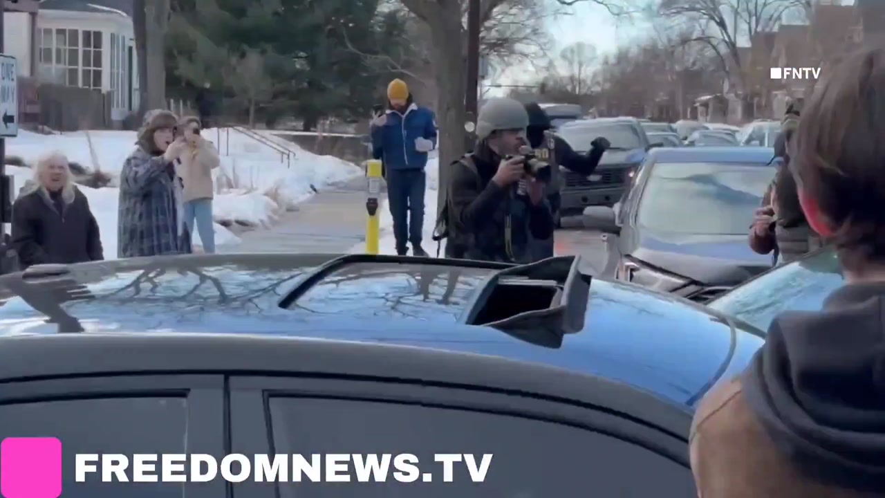 [Video] Woman pulled from car during clashes between activists and federal agents in Minneapolis